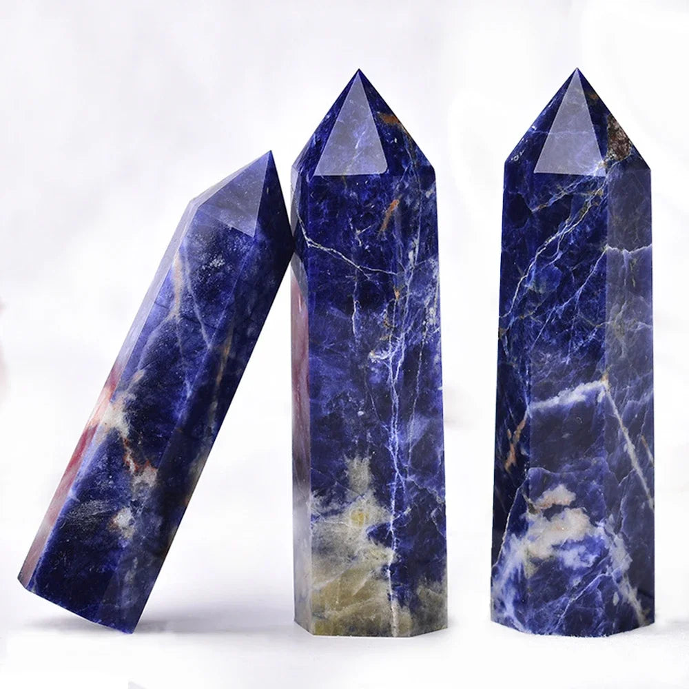 Three marbled stone towers on a white background